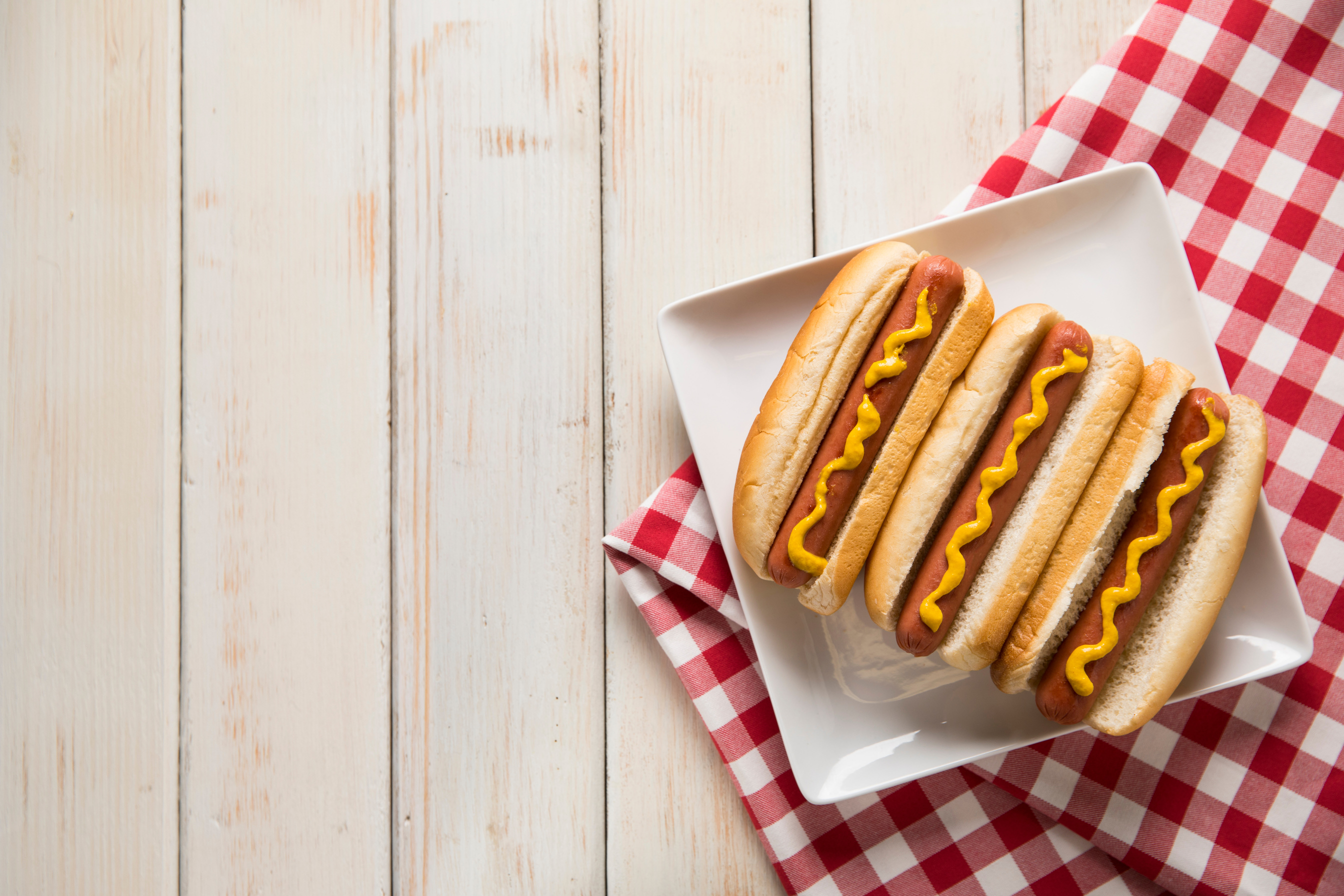 Hot Dog Picnic on White Bench